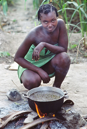 Haitian Girl with Cooking Fire